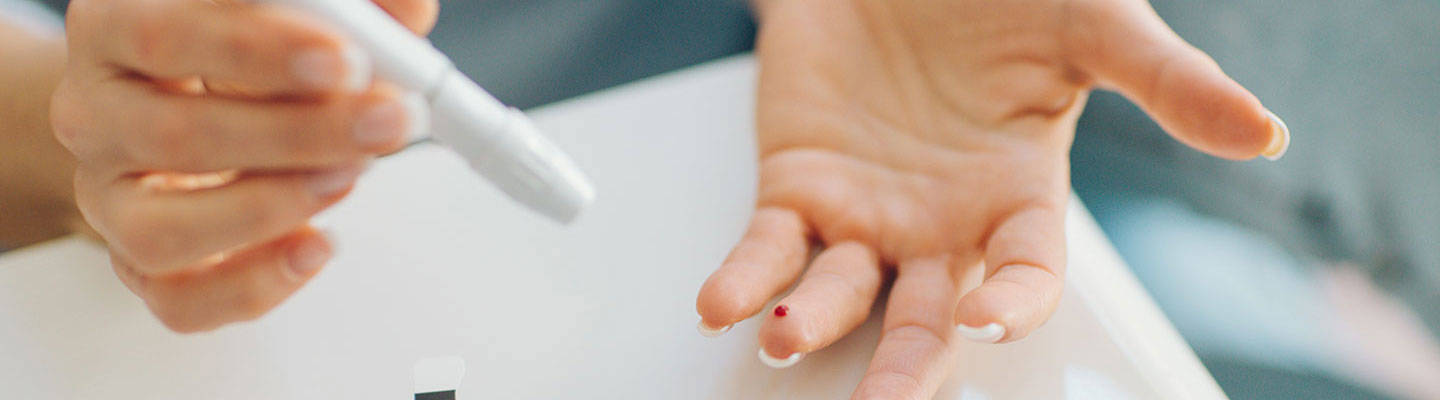 Close up of diabetes finger glucose test