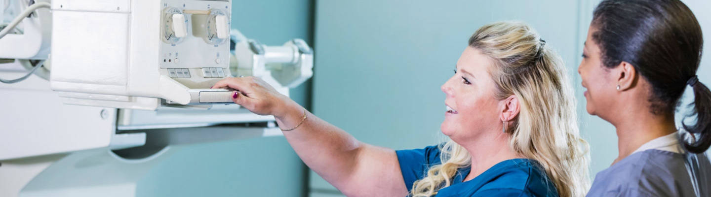 Radiology technicians with Xray machine