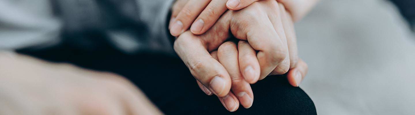 close up of holding hands