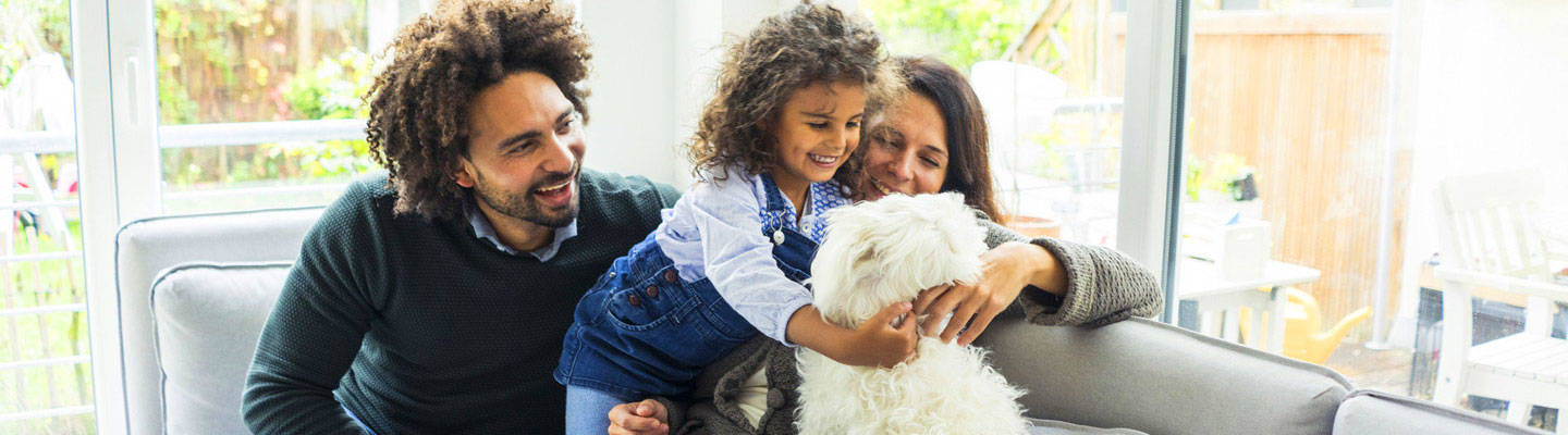 Family at home with family dog