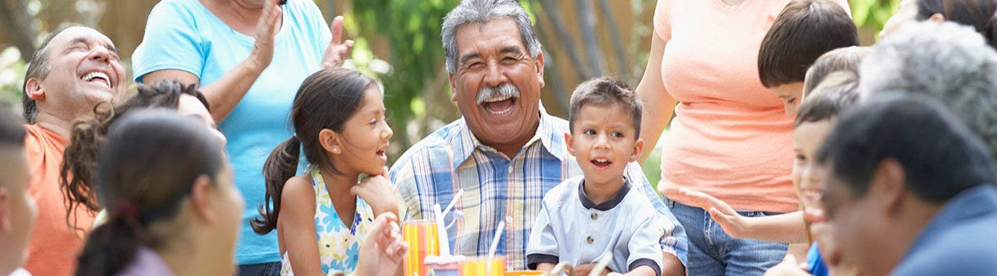 A family shares a picnic at a park
