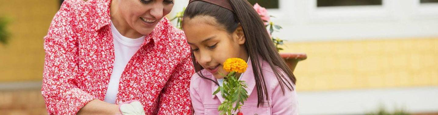 Mother and daughter gardening