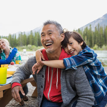 Family enjoying outdoor picnic Photo of Facey Medical Group - Canyon Country Adult Primary Care