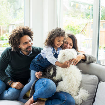 Family at home with family dog Photo of Providence Medical Group - Stanwood